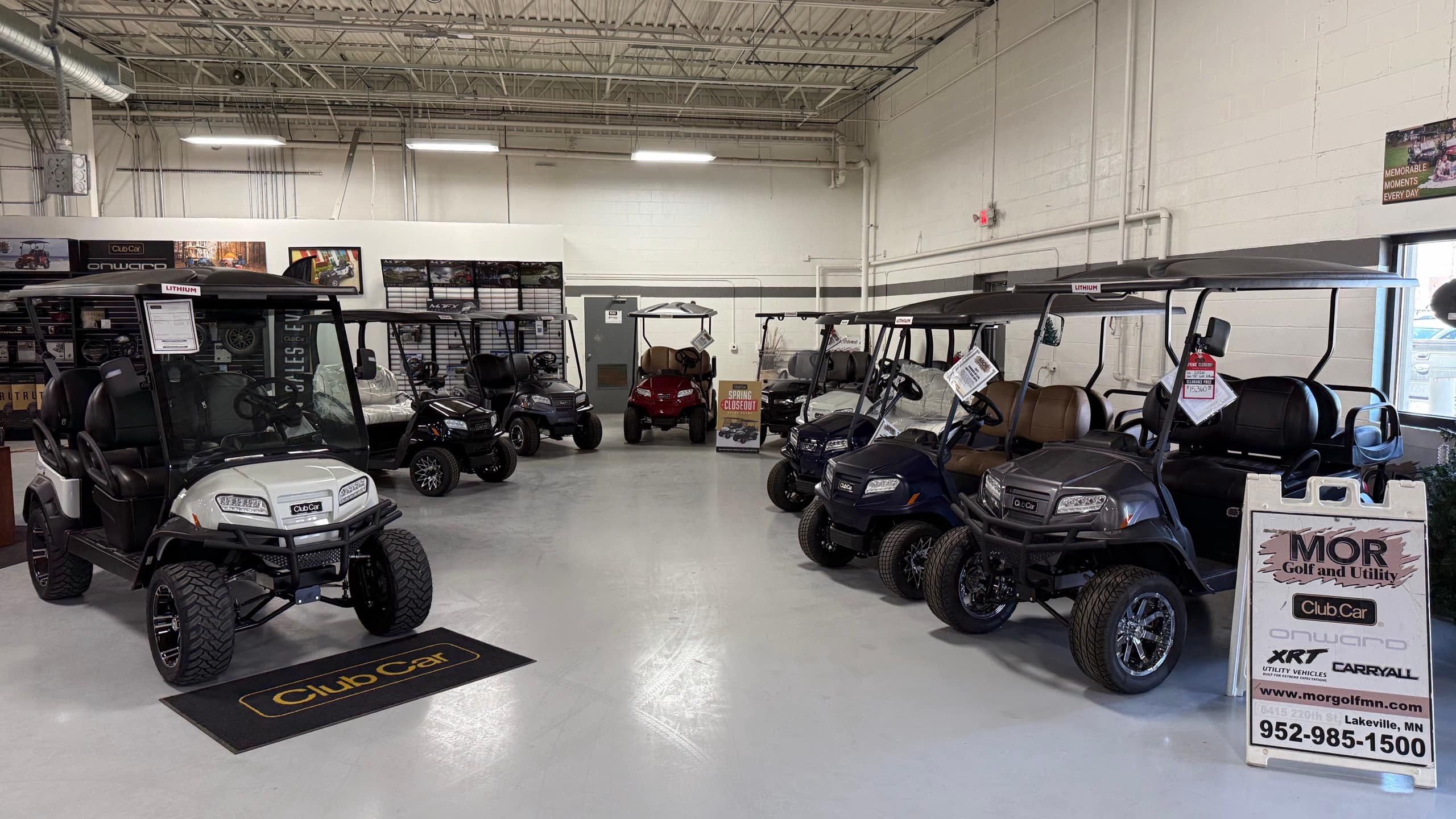 The MOR Golf and Utility showroom in Lakeville, lined with Club Car golf carts