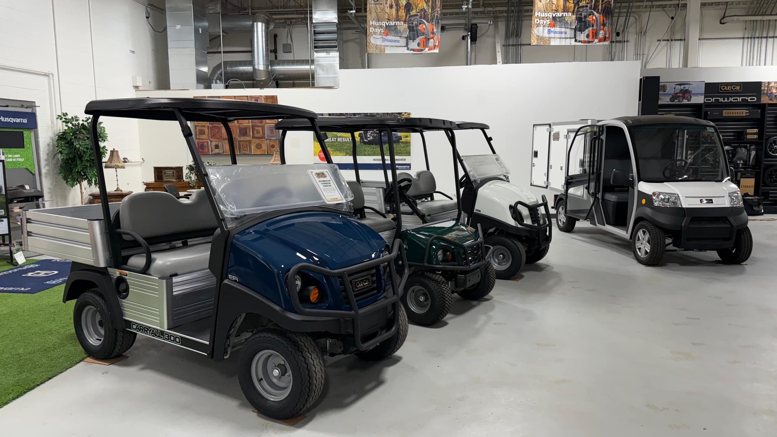 Inside the MOR Golf and Utility showroom in Lakeville, with Club Car utility vehicles on display